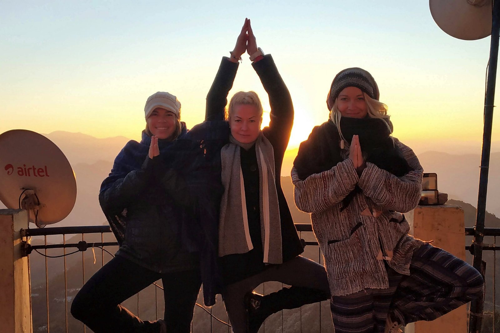 group tree pose sunrise hilltop rishikesh