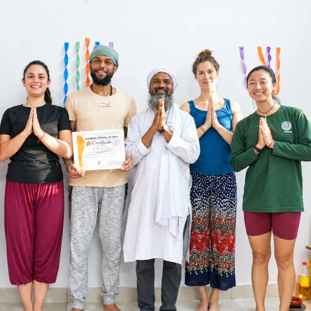 Acharya Siddhant with students at Siddhant School of Yoga in Rishikesh