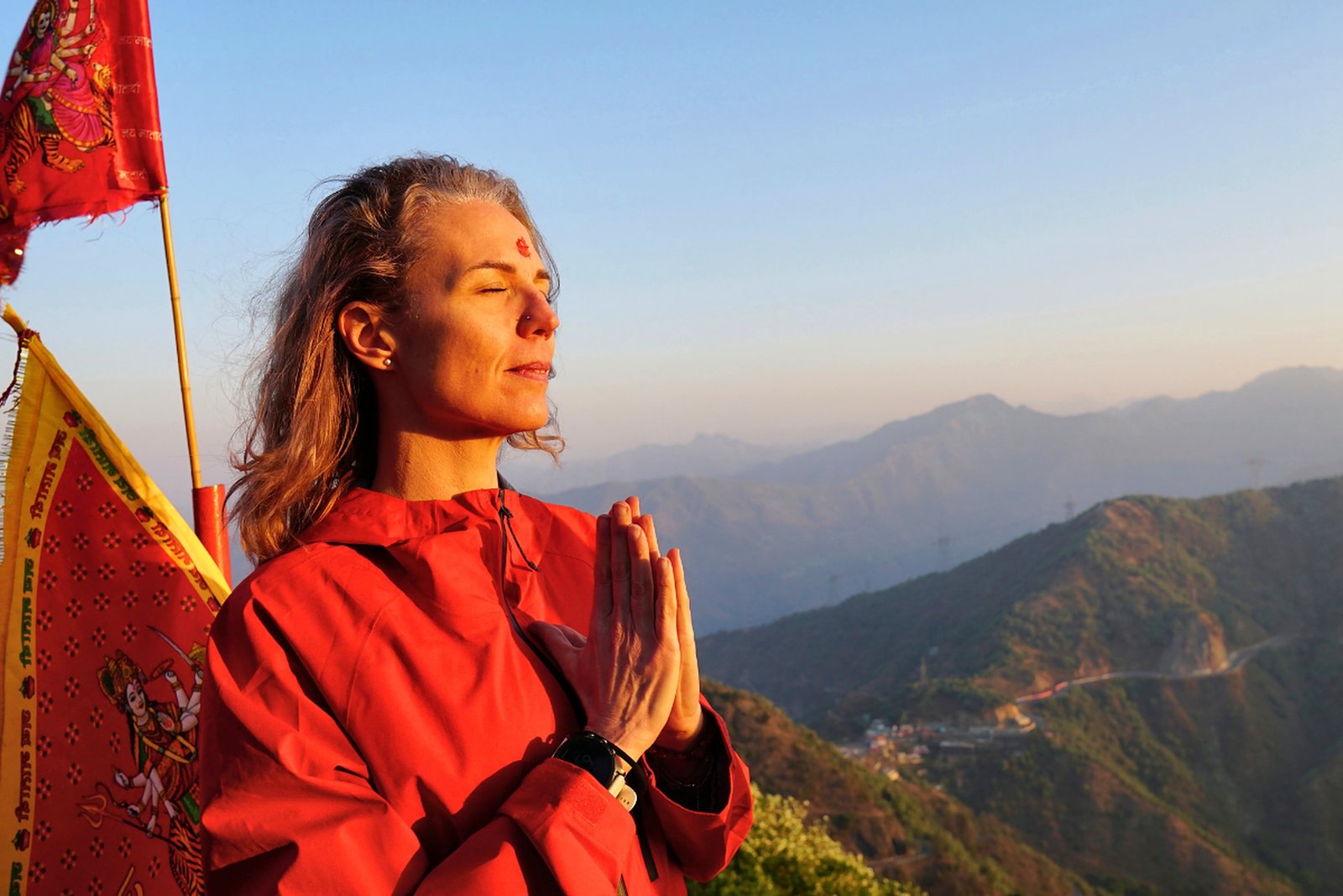 Sunrise prayer with a Himalayan view near Rishikesh