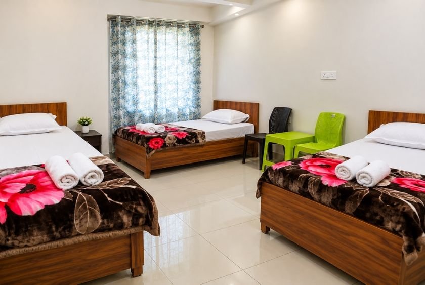 Triple share room accommodation at Siddhant School of Yoga in Rishikesh